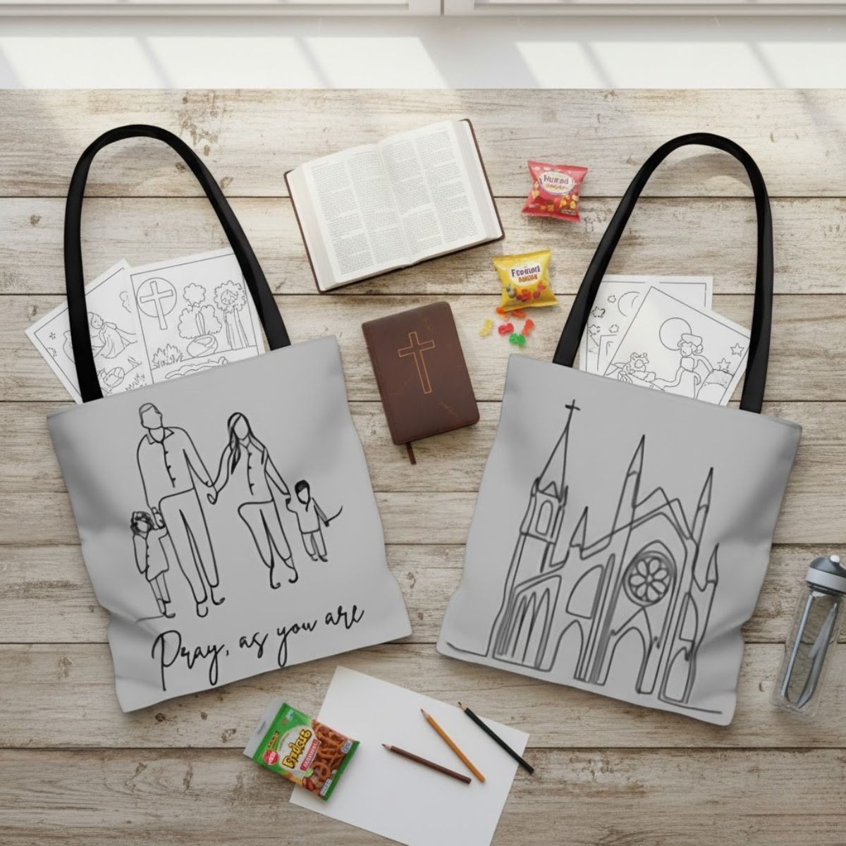 Gray Catholic tote bag with family line-art and “Pray, As You Are” text, reverse side showing cathedral illustration, Everyday Catholic Family design.
