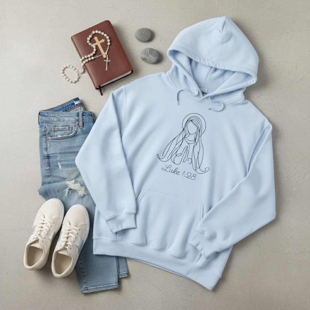 White hoodie with minimalist Virgin Mary line-art design and text “Luke 1:28,” Catholic faith sweatshirt for women by Everyday Catholic Family.